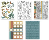 Five sheets of decorative scrapbook paper featuring botanical illustrations, butterflies, vintage text, and patterned borders on a white background.