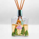 Fragrance diffuser with fairy design on a white background