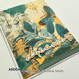 Decorative card with leaves, butterfly, and 'dreamer' text on a vintage map background, designed by Arden Creative Studio.