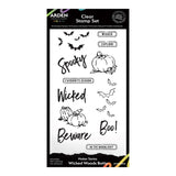 Arden Clear Stamp Set in 'Wicked Woods Bunny' featuring black and white Halloween-themed stamp designs including pumpkins, bats, and spooky text on a white sheet.