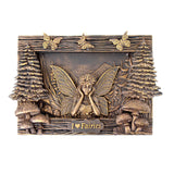 Bronze-colored belt buckle with fairy design and 'I ❤️ Fairies' text, surrounded by trees and mushrooms.