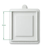 White square decorative wall plate with a recessed center panel and green dimension arrows indicating 94mm height, plus a small embossed XSD mark at the top and a copyright notice for Katy Sue Designs LTD at the bottom.