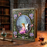 Decorative book titled 'Fairy Tales' with a fairy illustration on a wooden surface.