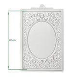 Decorative white card with floral patterns and measurements on a white background