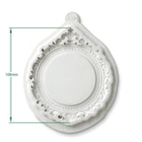 A white decorative wall mirror with an ornate embossed frame and a hanging loop at the top, shown on a white background with green dimension lines indicating a height of 108mm.