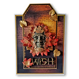 Decorative wall art with leaves and text on a white background