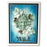 Framed artwork with a green leafy face and 'Yule' text on a blue background