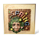 Decorative greeting card with a face made of leaves and flowers and the word 'Spring' spelled out.
