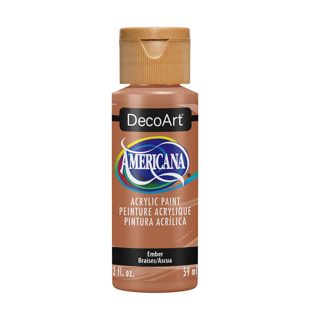 A bottle of DecoArt Americana acrylic paint in the color Ember, featuring a warm brown cap and a matching brown label with black and blue branding.