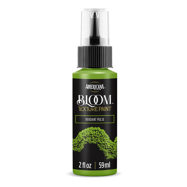 A bottle of Americana BLOOM Textured Paint in the shade Verdant Pulse Green, featuring a black label with gold lettering and a textured paint sample graphic, on a white background.