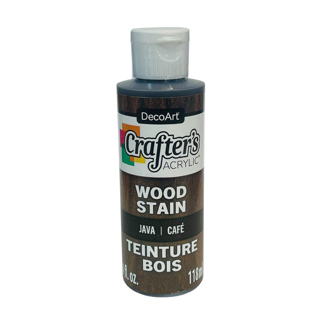 A bottle of DecoArt Crafter's Acrylic Wood Stain in the Java/Café shade, featuring a dark brown wood-grain label and a white cap.