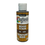 A bottle of DecoArt Crafter's Acrylic Wood Stain in the Oak color, featuring a wood-grain label and a white cap.