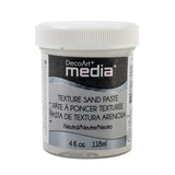 A jar of DecoArt Media Texture Sand Paste in 'Neutral' on a plain white background.