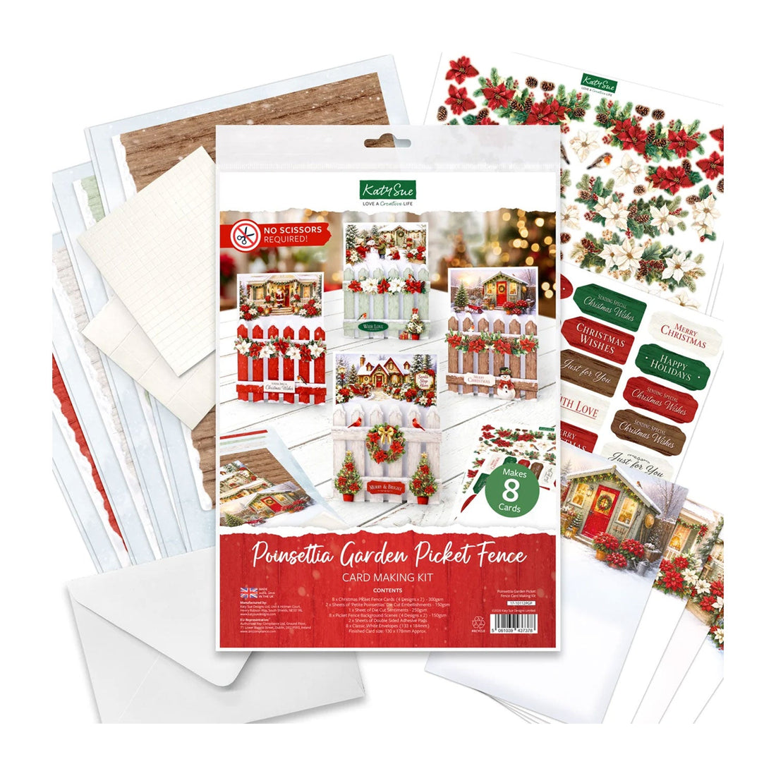 A card making kit package labeled 'Pinsetto Garden Picket Fence Card Making Kit' surrounded by included craft supplies on a white background, including patterned cards, envelopes, and decorative sheets with red, green, and white holiday designs.