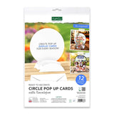 Kraft & Soda Circle Pop Up Cards with Envelopes in a white hanging retail package, showing a large white circular card base, small example photos of decorated displays, and text indicating 12 card and envelope sets.