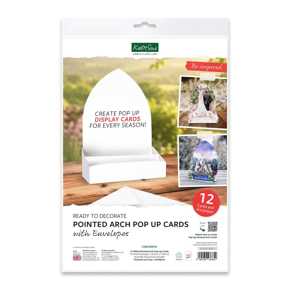Kraft on Shade Pointed Arch Pop Up Cards with Envelopes, featuring a white display card holder in the center of the packaging, with sample images of decorated pop-up cards on a white background.