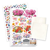 Sheet of floral and butterfly stickers with a white card on a white background