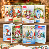 Collection of Christmas greeting cards with festive designs on a wooden surface.