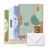 Set of greeting cards with various designs and a white envelope on a white background