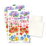 Two sheets of floral paper with colorful flowers on a white background