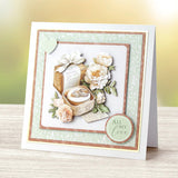 Greeting card with floral design and 'All My Love' text on a wooden surface.