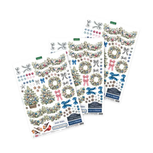 Three sheets of decorative holiday stickers arranged in a fan shape on a white background. The sheets feature various Christmas-themed embellishments including wreaths, bows, trees, ornaments, and birds in silver, blue, pink, and green colors.