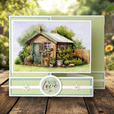 Garden scene with a small wooden shed and plants on a card with 'With Love' text.