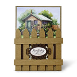 Card with a wooden fence design and a garden scene in the background