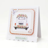 Wedding-themed card with a vintage car and floral decorations on a white background
