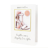 Greeting card with high-heeled shoe illustration and floral elements on a white background