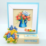 Decorative birthday card with flowers and text on a white background