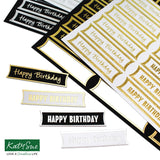 A set of layered 'Happy Birthday' banner stickers in black, white, and gold foil, displayed on a clean white background with the Katy Sue brand logo in the bottom-left corner.