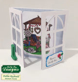 Decorative card with garden scene and 'Have a lovely day' message, featuring Holly Hobbie Designs branding.