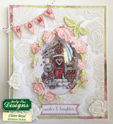 Decorative card with floral elements and a small house illustration, featuring the brand 'Nancy Sue Designs'.