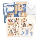Set of Christmas cards with nativity scene illustrations and envelopes.