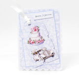 Set of wedding-themed pins with a cake and car design on a white background