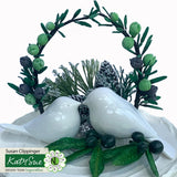 Decorative arrangement with white birds, greenery, and berries on a white background