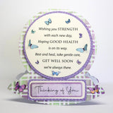 A 3D pop-up greeting card with a circular message that reads 'Wishing you STRENGTH with each new day, Hoping GOOD HEALTH is on its way. Rest and heal, take gentle care, GET WELL SOON we're always there.