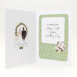 Wedding card with a photo of a couple and floral design on a white background