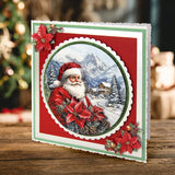Christmas card with Santa Claus in a snowy scene, surrounded by poinsettias on a wooden surface.