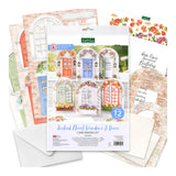 Card making kit with floral window and door designs on a white background