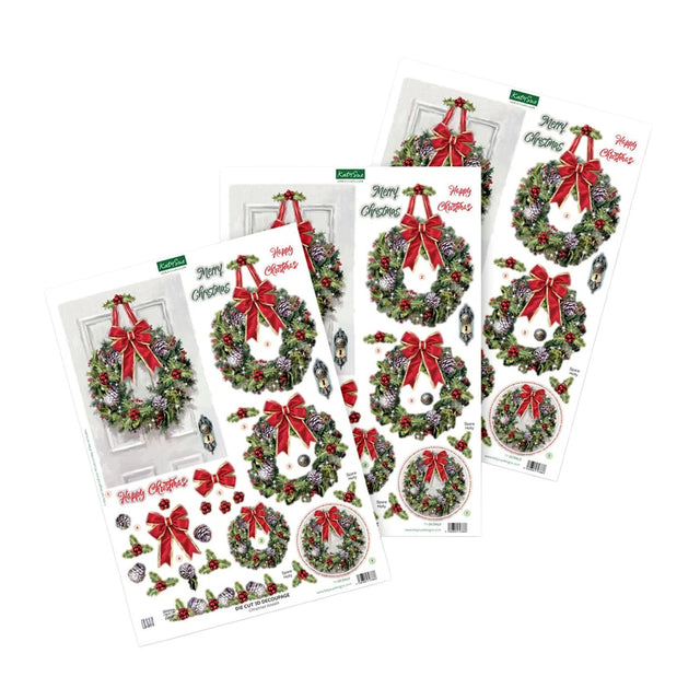 Four sheets of Christmas door wreath decals arranged on a white background, featuring green wreaths with red bows, pinecones, ornaments, and holiday decorations.