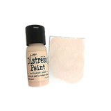 Distress Paint bottle with a swatch of applied color on a white background