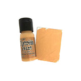Distress Paint bottle with a swatch of orange color on a white background