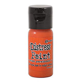 Orange bottle of Ranger Distress Paint with black cap on a white background
